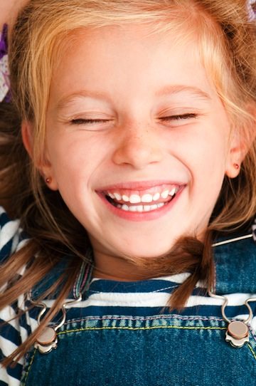 girl with eyes closed